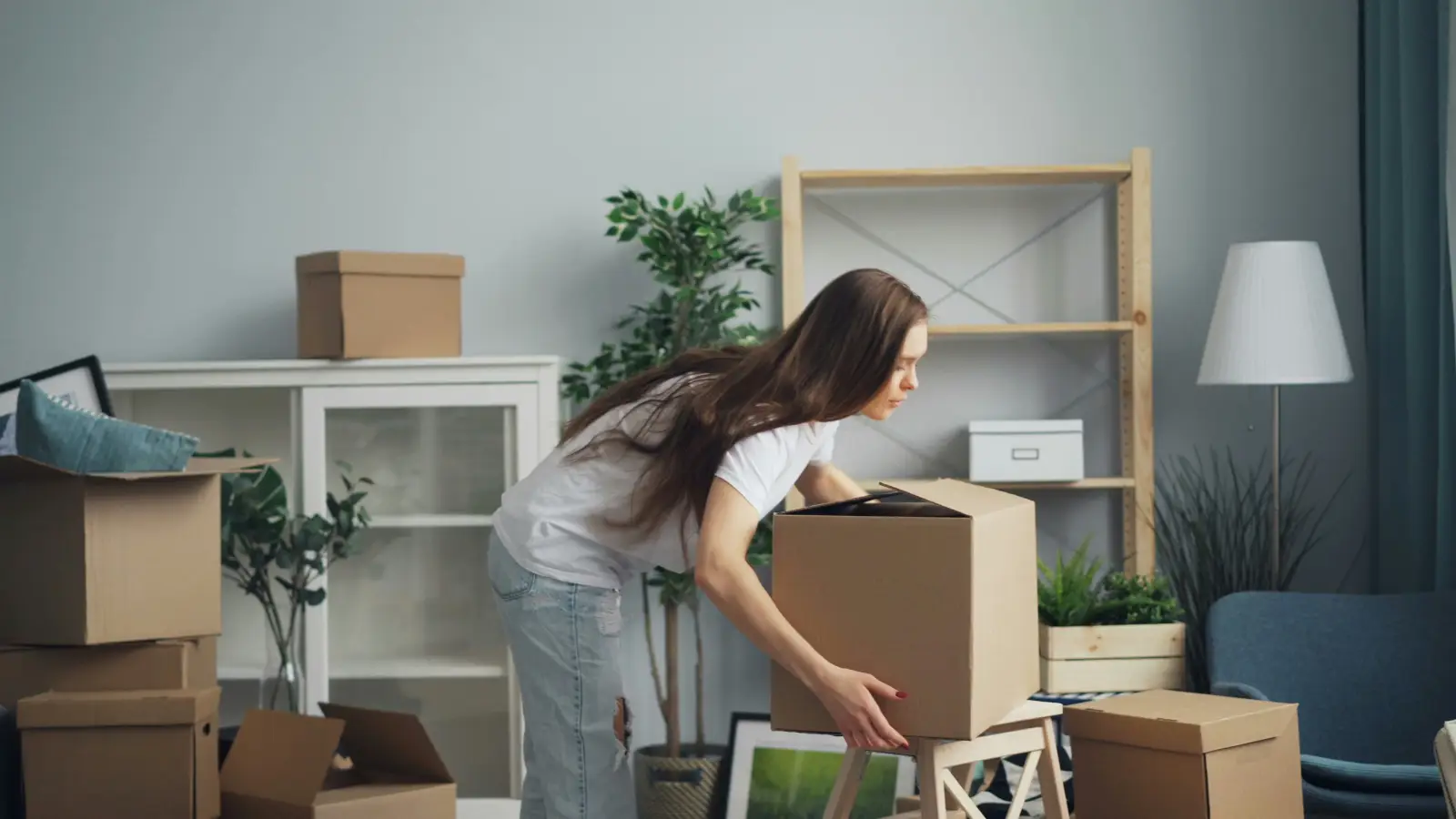person moving boxes person moving boxes